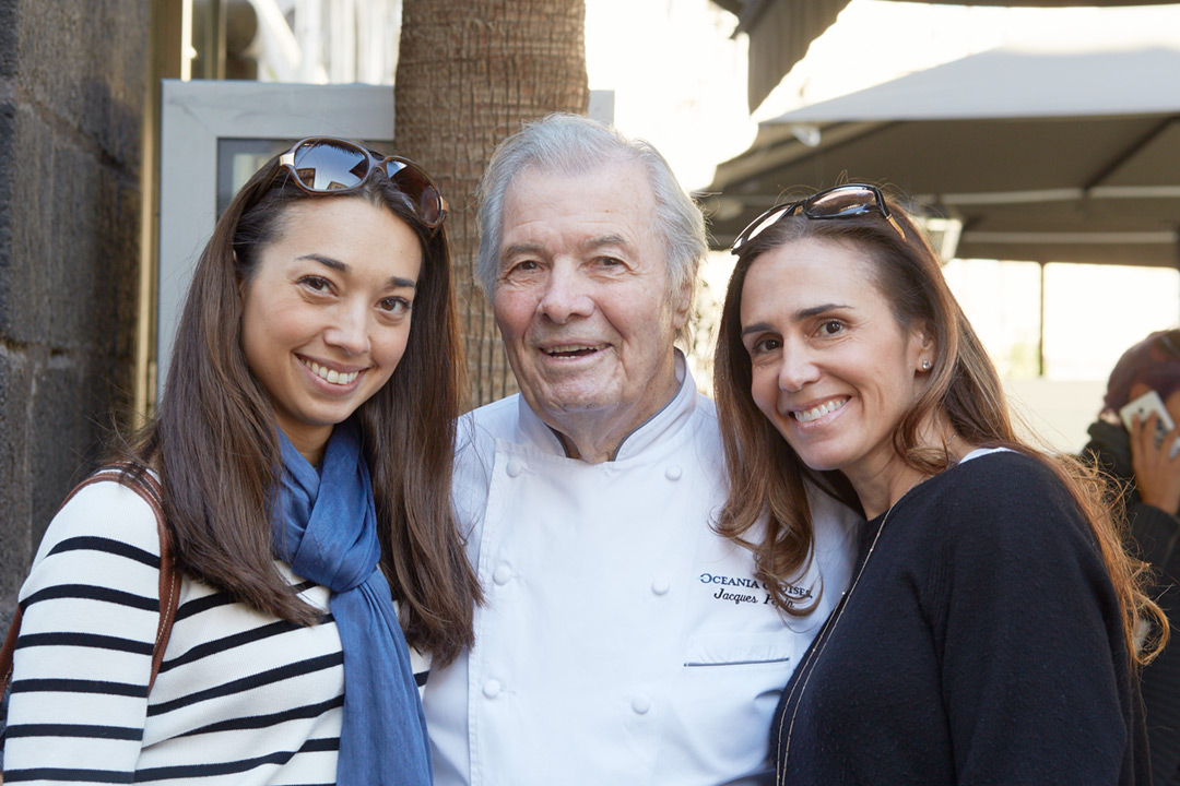 Photograph of Chef and Artist Jacques Pepin. Here’s Jacques with admirers in France.