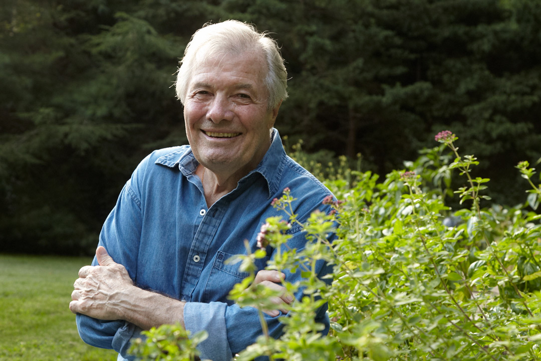 Photograph of Chef and Artist Jacques Pepin. Here’s Jacques in his yard at home.