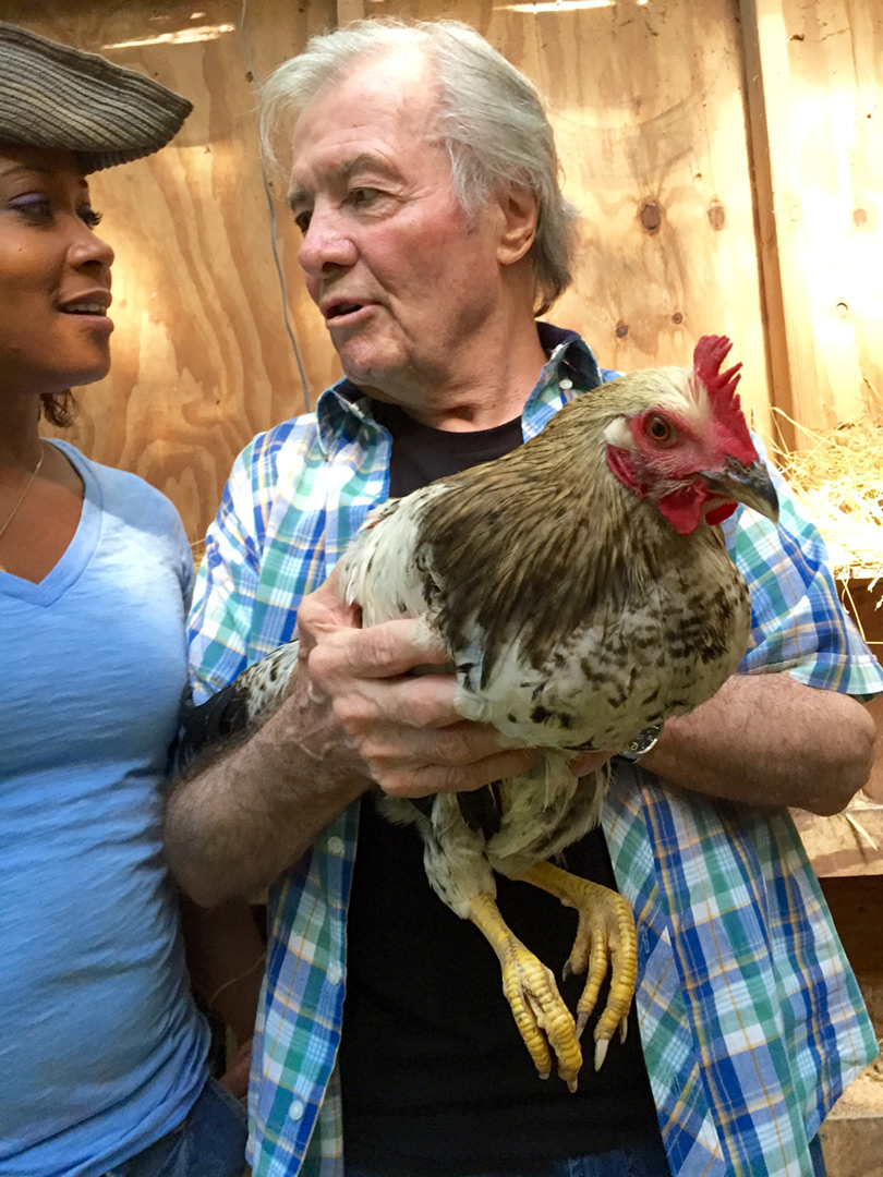 Chef Jacques Pepin Holding a Chicken