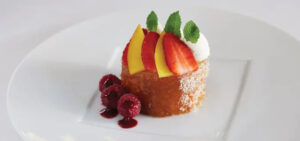 Oceania Cruises: Executive Chef Jacques Pepin’s Favorite Foods: “Baba au Rhum” dessert in the “Jacques” Dining Room