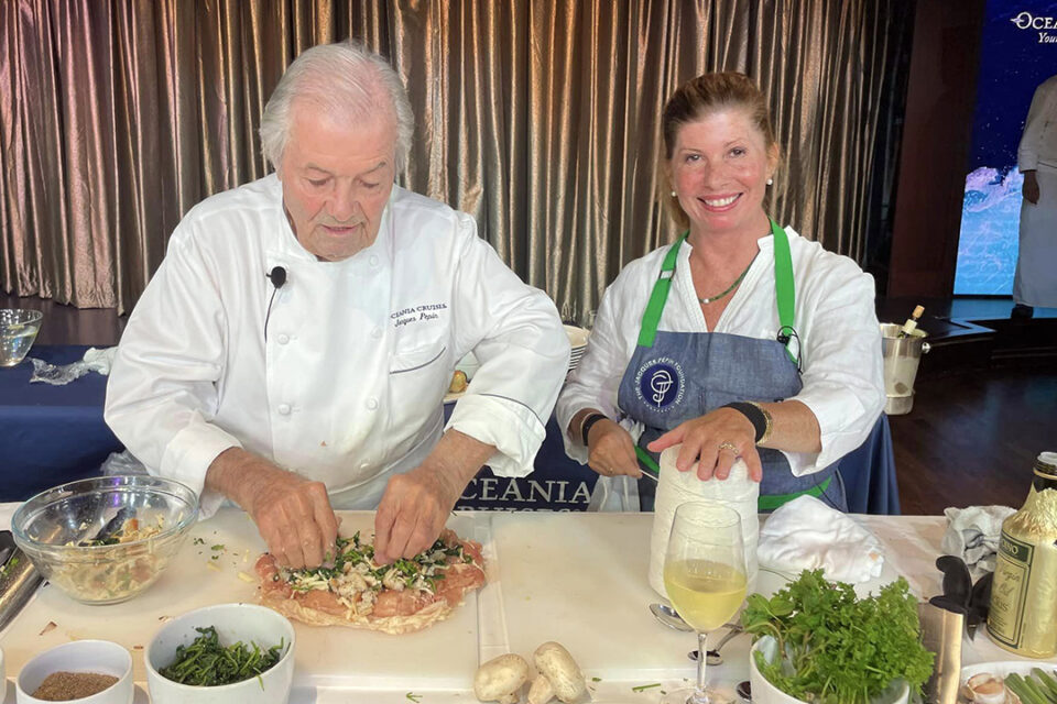 Oceania Cruises’ Executive Culinary Director Jacques Pepin with his daughter Claudine during a cooking demo aboard ship.