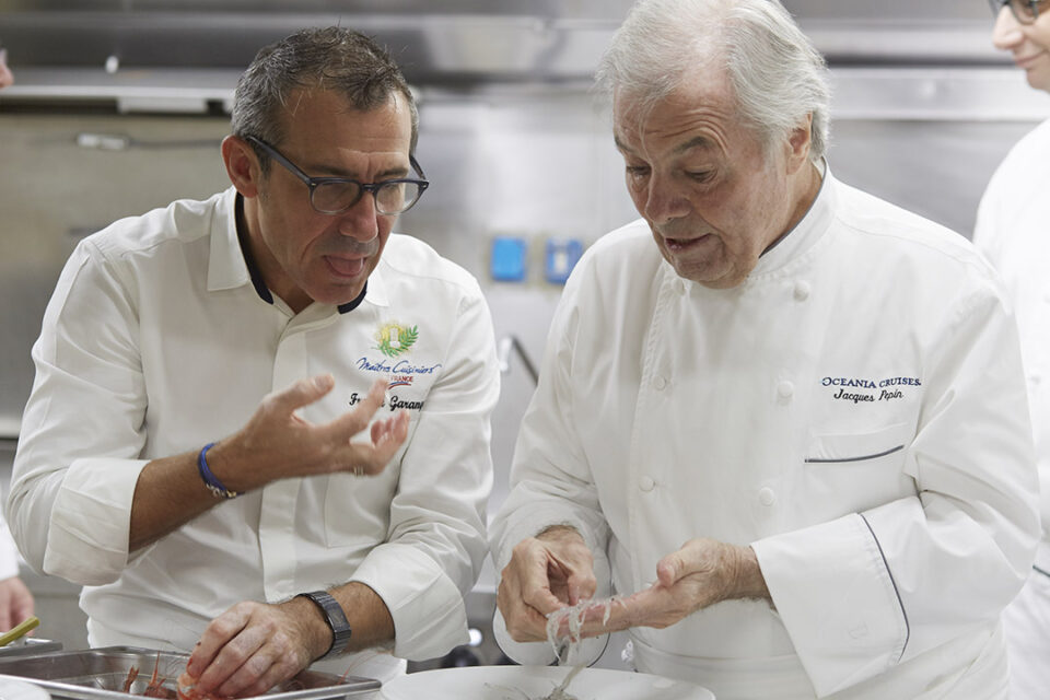 Oceania Cruises’ Executive Culinary Director Jacques Pepin with Franck Garanger, Oceania’s Culinary Director—France, in the kitchen aboard an Oceania cruise ship.