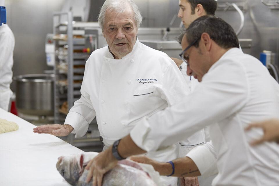 Oceania Cruises’ Executive Culinary Director Jacques Pepin with Franck Garanger, Oceania’s Culinary Director—France, in the kitchen aboard an Oceania cruise ship.
