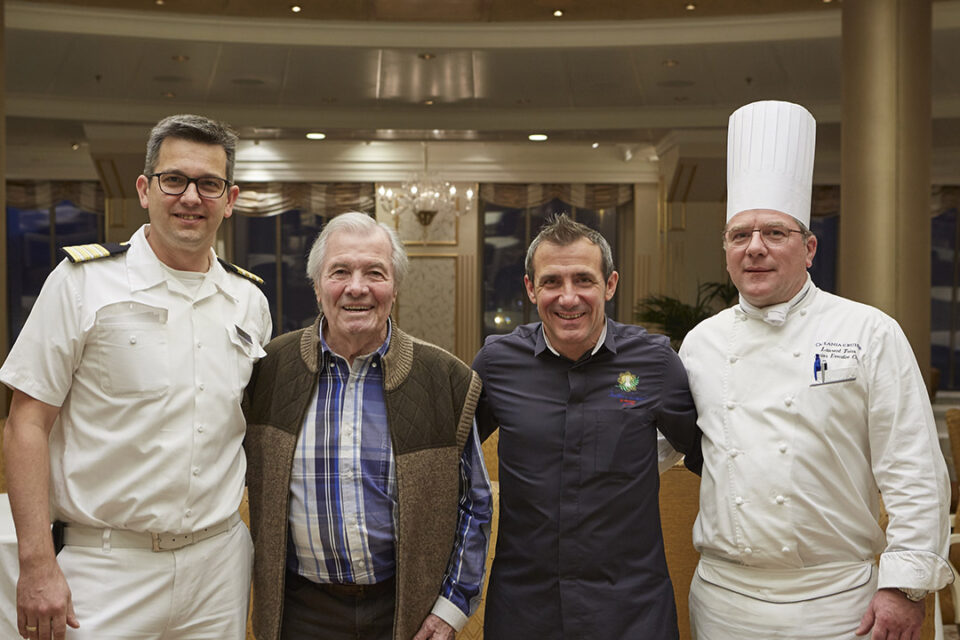 Oceania Cruises’ Executive Culinary Director Jacques Pepin aboard ship with Franck Garanger, Oceania’s Culinary Director, France left of Jacques and others.