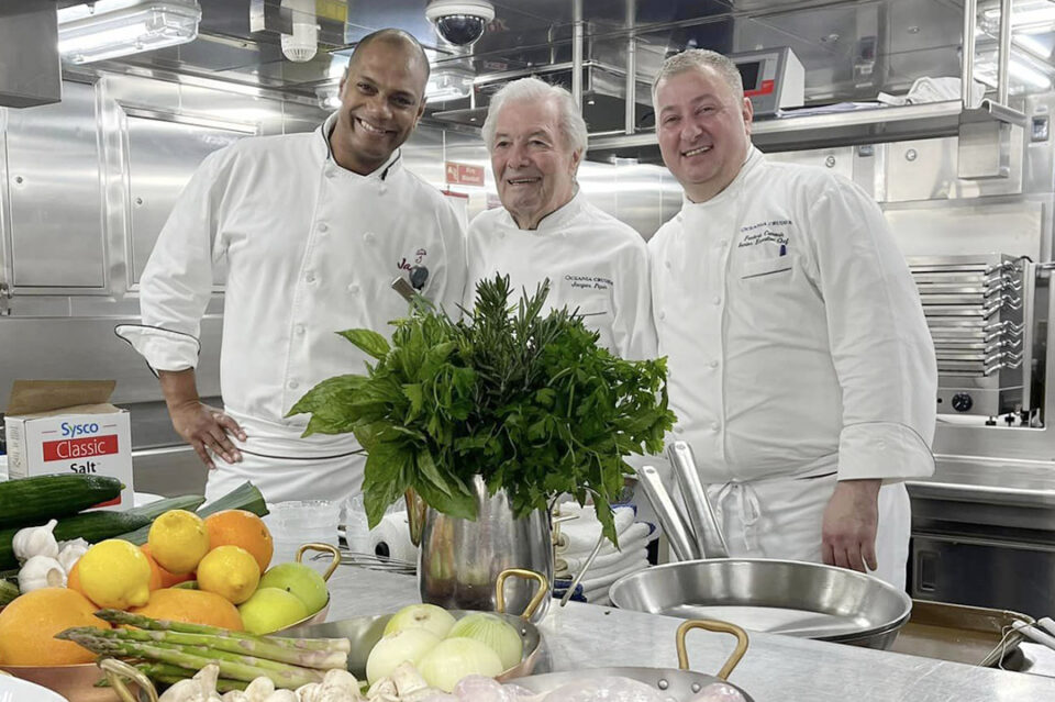 Oceania Cruises’ Executive Culinary Director Jacques Pepin in the cruise ship’s kitchen with culinary staff.