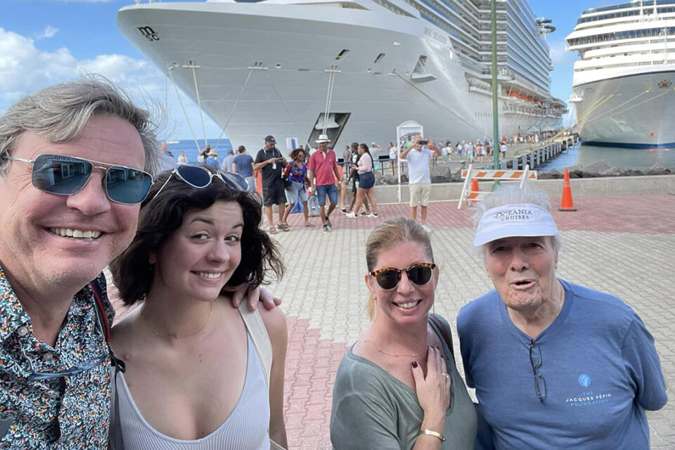 Oceania Cruises’ Executive Culinary Director Jacques Pepin surrounded by family in a port-of-call.