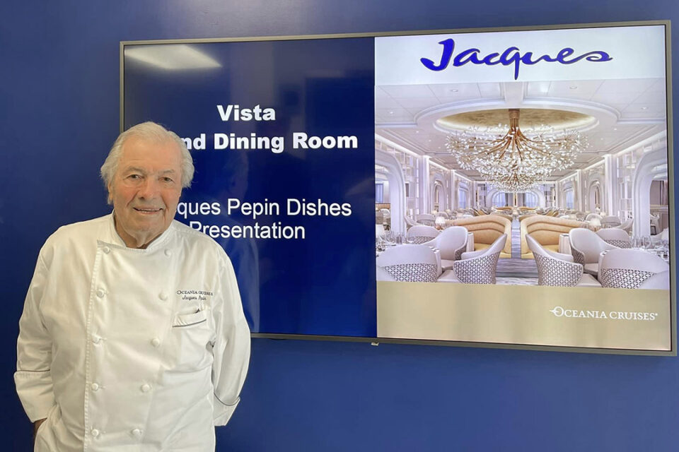 Oceania Cruises’ Executive Culinary Director Jacques Pepin in front of the restaurant bearing his name aboard ship.